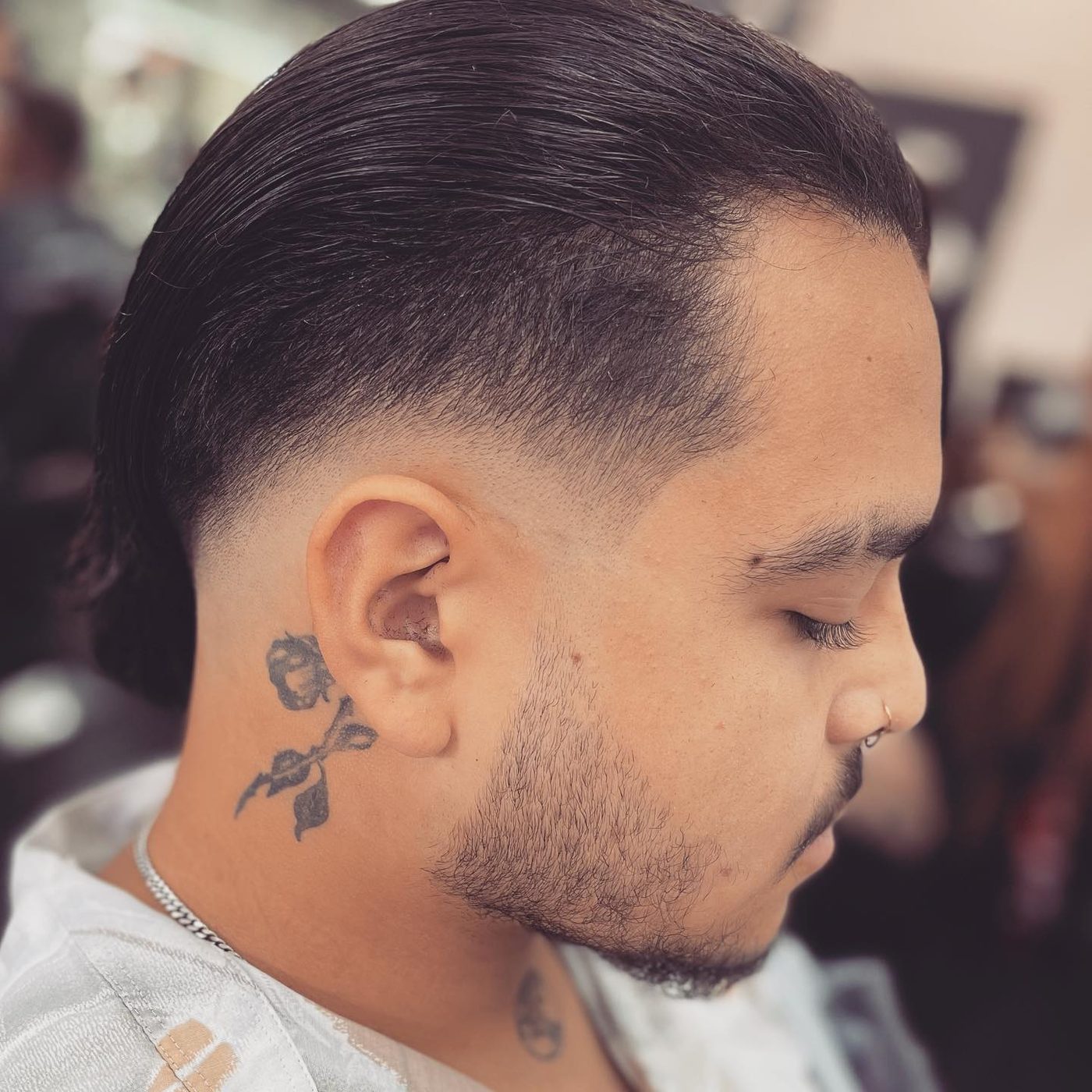 Slick Back mit Low Fade – Herrenhaarschnitt bei HUK Barber Zürich Oerlikon